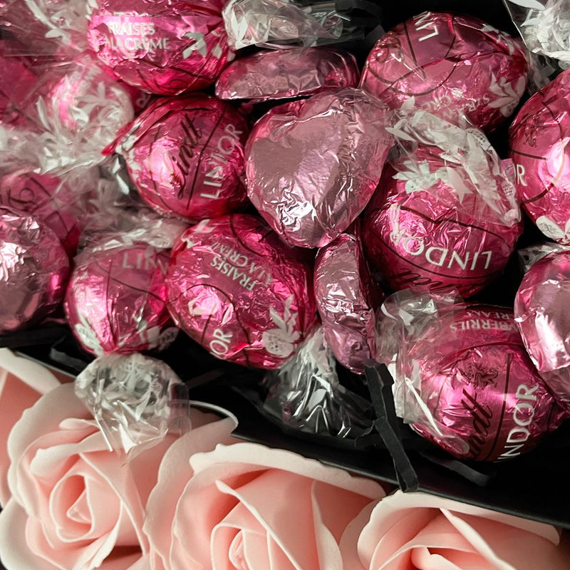 Yankee Candle Ultimate Gift Hamper With Pink Roses close up of strawberry and cream lindt lindor truffles