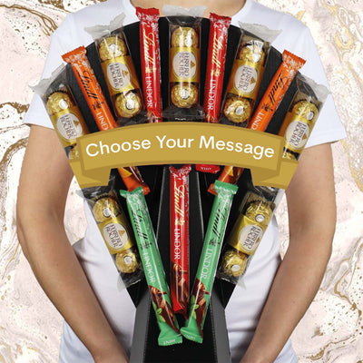 The perfect treat for a chocolate lover! Introducing our delicious Ferrero & Lindt Chocolate Bouquet. This impressive trophy display is full of chocolate treats with Ferrero Rocher & Lindt Lindor in Milk Chocolate, Orange and Mint. This unique chocolate bouquet makes a great gift for all celebrations, whether it’s Happy Birthday, Thank You, Congratulations and more!