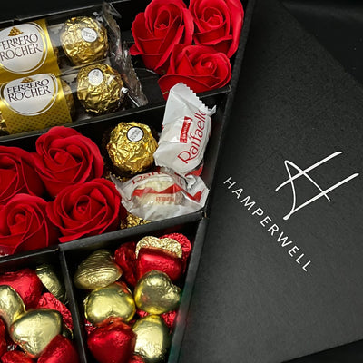 Ferrero Rocher &amp; Raffaello Signature Schokoladenstrauß mit roten Rosen