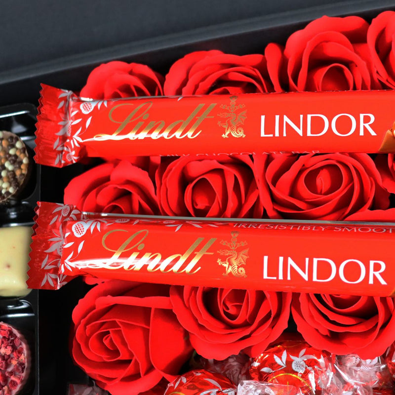Lindt Lindor Ultimate Gift Hamper With Red Roses close of of Lindt Lindor Treat Bars