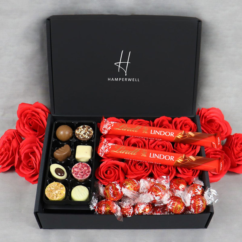 Lindt Lindor Ultimate Gift Hamper With Red Roses with lindor stick bars, lindor truffle and handmade truffles