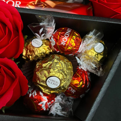 Lindt Lindor & Ferrero Rocher Signature Chocolate Bouquet With Red Roses close up of ferrero rocher and lindt lindor chocolate truffles