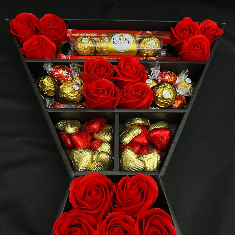 Lindt Lindor & Ferrero Rocher Signature Chocolate Bouquet With Red Roses close up from below looking at bouquet
