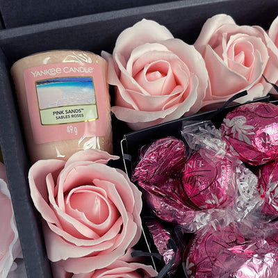 Yankee Candle Ultimate Gift Hamper With Pink Roses close up of stunning pink roses, chocolate truffles and candles