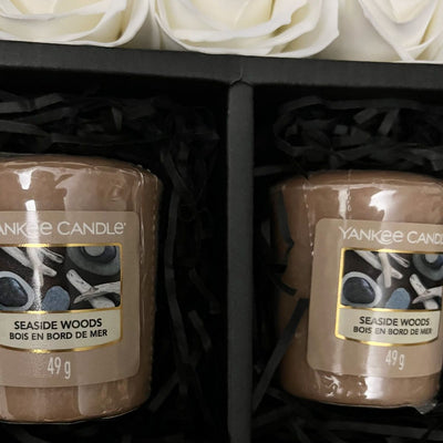Two official Yankee Candle votives in the scent Seaside Woods inside the chocolate bouquet packaging exclusive to HamperWell