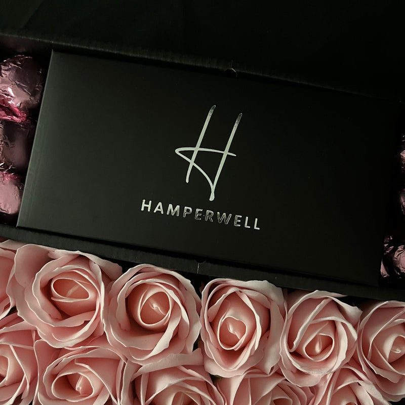 HamperWell Handmade Artisan Truffles Box with HamperWell embossed logo on box featuring stunning pink roses