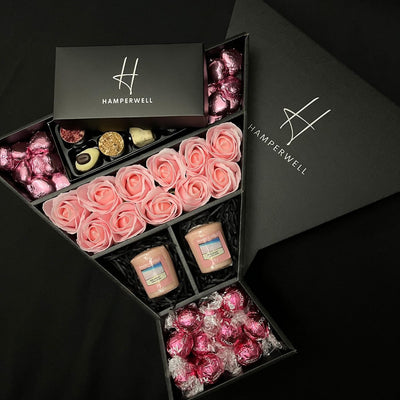 Lindt Lindor & Yankee Candle Signature Chocolate Bouquet With Pink Roses laid out to show stunning contents and packaging