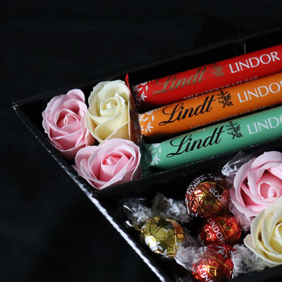 Assorted Lindt Lindor Signature Chocolate Bouquet With Pink & Ivory Roses - Close Up